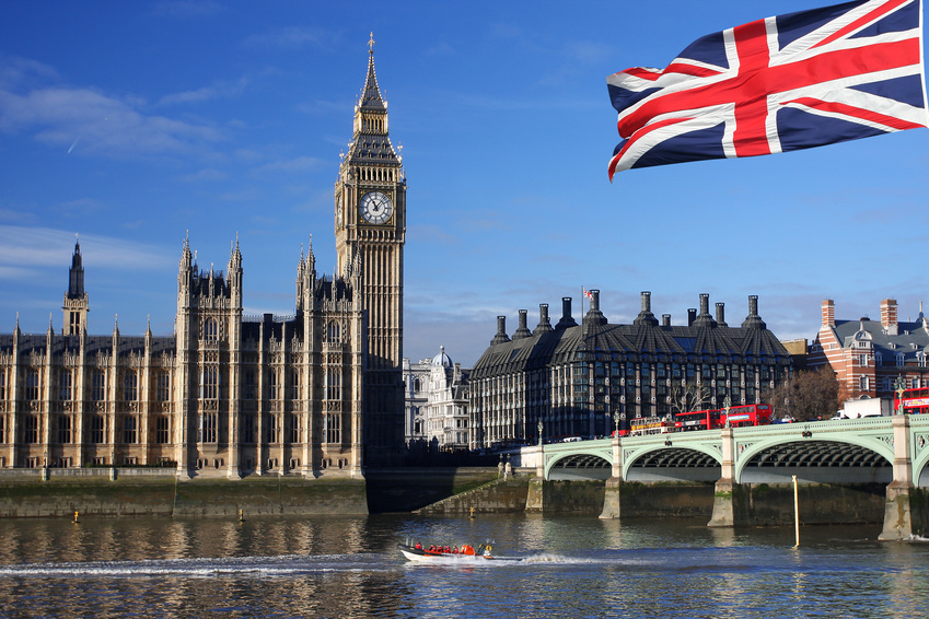 Big Ben with  city boat in London, UK